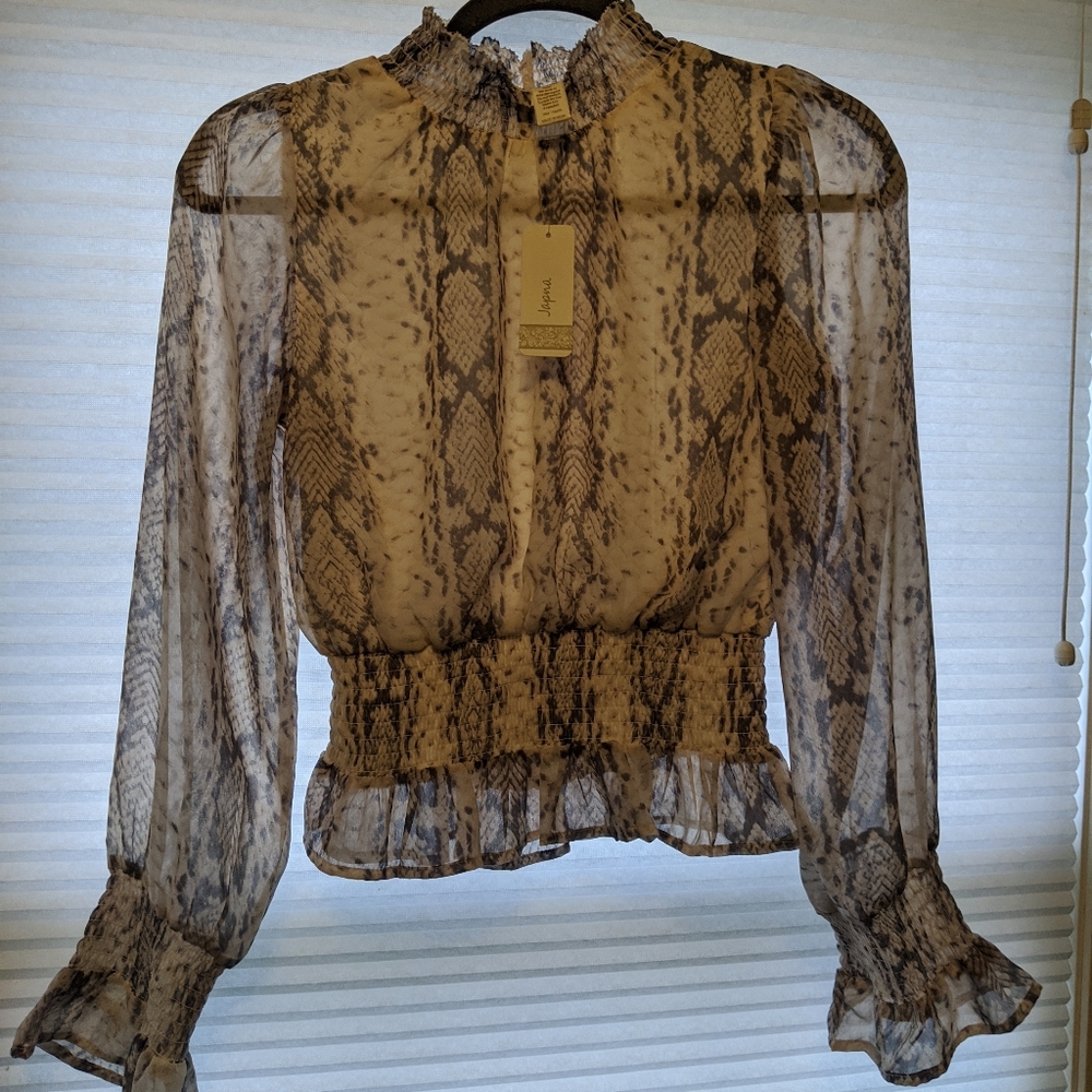Adorable smocked peplum long sleeve snakeskin